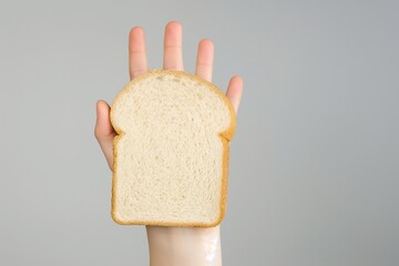 Gluten allergy, hand holding bread slice, refusing to eat, Gluten intolerant and Gluten free diet concept - obrazy, fototapety, plakaty