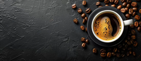 Gartenposter cup of black coffee surrounded by coffee beans on rustic black background  © Menganga