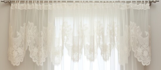 A white lace curtain made of transparent material is draped over a rectangular window made of wood and glass. The intricate pattern adds a touch of elegance to the room