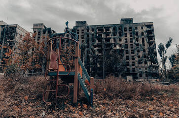 destroyed and burned houses in the city during the war in Ukraine