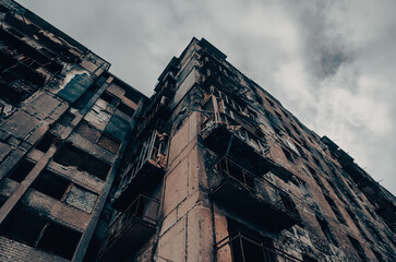 destroyed and burned houses in the city during the war in Ukraine