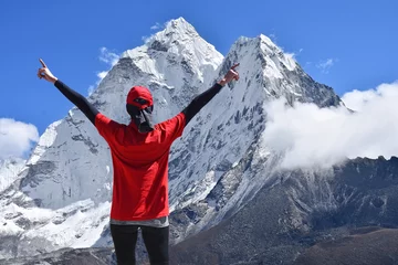 Printed kitchen splashbacks Ama Dablam Female hiker with open arms on top of mountain. Happy woman enjoying the view of Mount Ama Dablam in Himalaya, Nepal