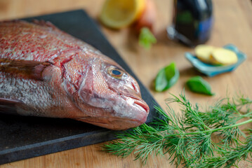 Sea bream fish. with fresh ingredients. 