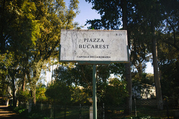 Piazza Bucarest sign with park