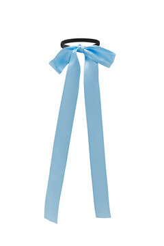 Close-up shot of a black hair tie decorated with a blue bow. A woman's blue bow hair tie is isolated on a white background. Front view.