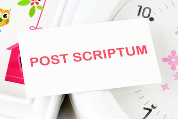 POST SCRIPTUM ancient Latin saying meaning - afterthought, afterwards text on a white card