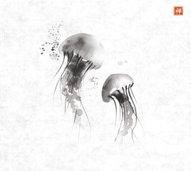 Ink painting of gracefully floating jellyfishes on rice paper background. Traditional oriental ink painting sumi-e, u-sin, go-hua. Translation of hieroglyph - zen