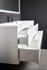 Integrated basin white countertop bathroom with horizontal drawer with sliding pull out shelves....
