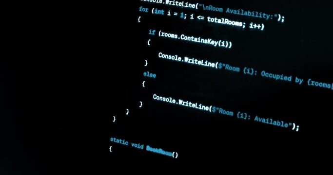 hacker scrolls program code on notebook computer, cyber security concept