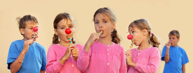Collage with three girl and two boy (two models) with clown nose suck multicolored candies