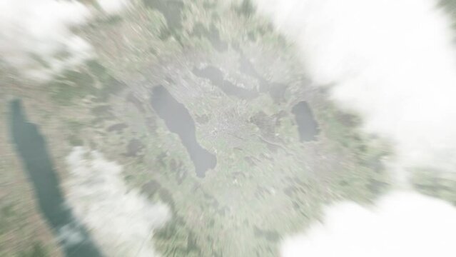 Earth zoom in from space to Uster, Switzerland. Followed by zoom out through clouds and atmosphere into space. Satellite view. Travel intro. Images from NASA