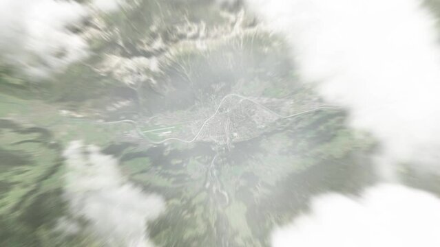 Earth zoom in from space to Innsbruck, Austria. Followed by zoom out through clouds and atmosphere into space. Satellite view. Travel intro. Images from NASA