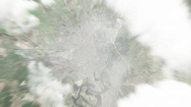 Earth zoom in from space to Gomel, Belarus. Followed by zoom out through clouds and atmosphere into space. Satellite view. Travel intro. Images from NASA