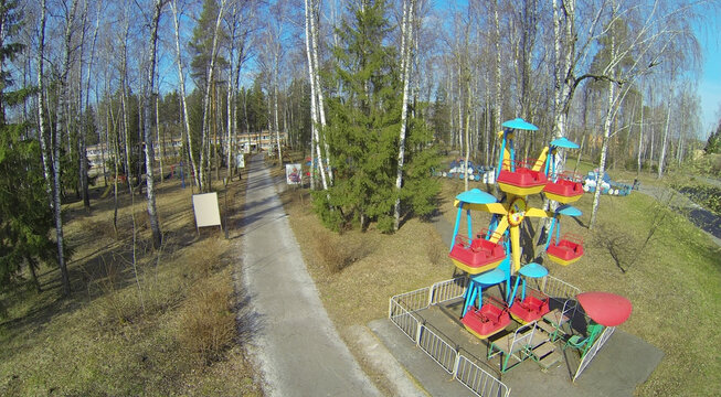 Childrens playground among the trees in health camp for children, aerial view