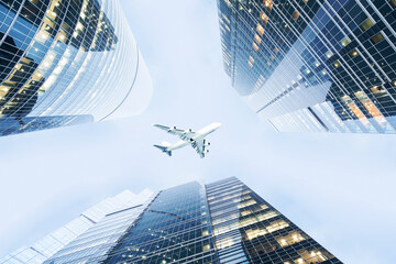 Airplane flying past three modern skyscrapers, collage