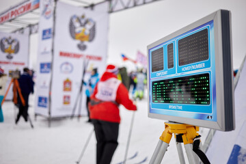 Time electronic panel at Ski Run competition.  - obrazy, fototapety, plakaty