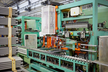 Automated production line at plastic pipes factory.