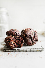 Styled chocolate muffins in a white kitchen