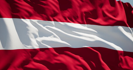 Close-up of the national flag of kingdom Austria flutters in the wind on a sunny day
