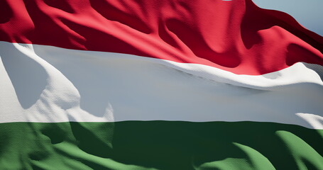 Close-up of the national flag of Hungary flutters in the wind on a sunny day