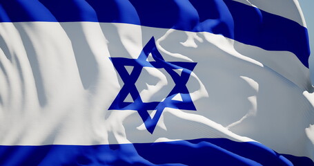 Close-up of the national flag of Israel flutters in the wind on a sunny day
