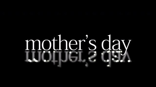 A black background with white Mothers Day text, mirrored in water. Symbolizes celebrating mothers and the profound love they provide to their children