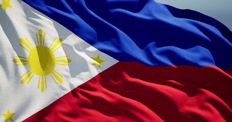 Close-up of the national flag of Philippines flutters in the wind on a sunny day