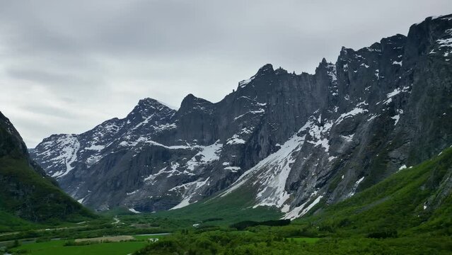 Trollveggen Troll Wall in Romsdalen Valley, Rauma, Norway. Trolltindene Troll Peeks Mountain range