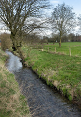 Fototapeta na wymiar Eyserbeek and Landscapes at Simpelveld Zuid Limburg Netherlands. River. Stream.