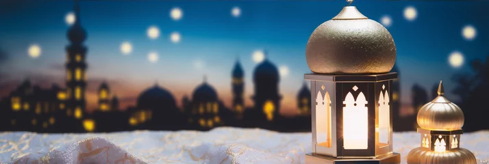 Fotobehang Ramadan Kareem greeting card with glowing golden lantern and cityscape of illuminated mosques in the background © lyndaahram