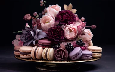Fotobehang Still life of purple, pink, and cream colored flowers and macarons on a gold cake stand with a dark background. © slawatchisherazad