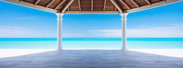 Fototapeta na wymiar Wooden deck over white sand beach and turquoise ocean in a sunny day