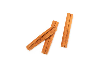 Cinnamon sticks isolated on white background. Cinnamon roll. Spicy spice for baking, desserts and drinks. Fragrant ground cinnamon.