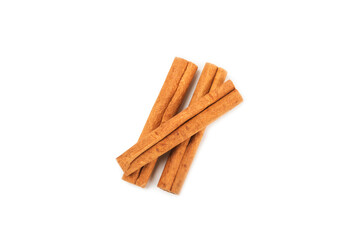 Cinnamon sticks isolated on white background. Cinnamon roll. Spicy spice for baking, desserts and drinks. Fragrant ground cinnamon.