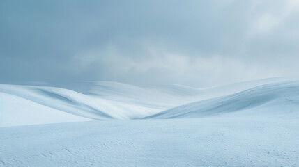 Serene Winter Landscape: Pristine Snowy Dunes under a Subtle Sky