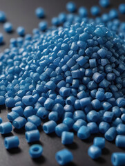 Fototapeta premium Secondary Granule Made Of Polypropylene, Blue Plastic Pellets Crumbles To The Table, Plastic Raw Materials In Granules, Industry, Polymer Resin, Raw Plastic Recycling Concept