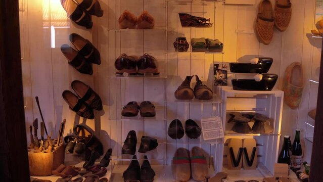 Zaanse Schans, Netherlands, March 29 2023: Vintage machine tools in small workshop producing klompen (clogs) - famous traditional dutch footwear made completely from wood
