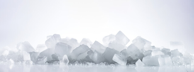 A pile of large pieces of ice on a white background.