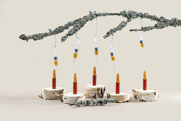 ampoules on a podium made of wooden sections and syringes on a branch with lichens on a beige background