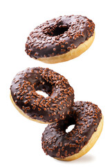 Chocolate donuts falling on a white background. Isolated