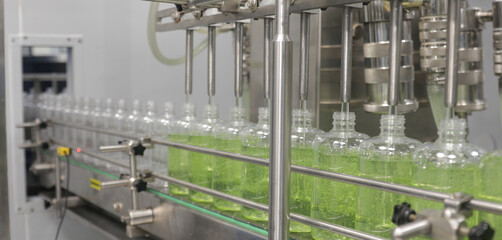chemical liquid sanitiser gel fills in bottles aqueous soap hand wash detergent production line...