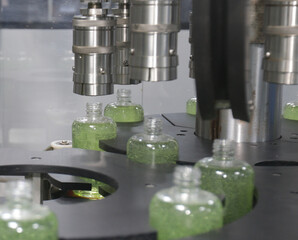 chemical liquid sanitizer soap hand wash production line filling making process in a plastic...