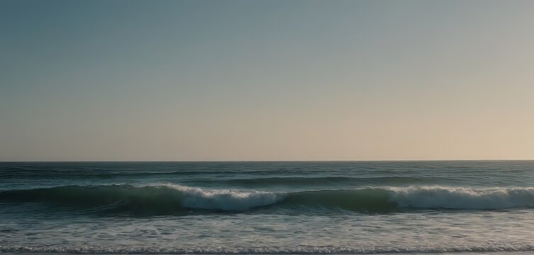 Big breaking Ocean wave on a sandy beach on the north shore of Oahu Hawaii