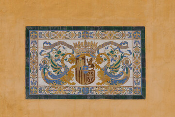 Seville (Spain). Tile with heraldic shield in the Real Alcázar of Seville