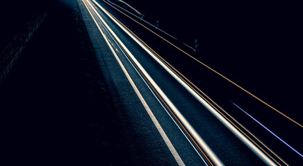 lights of cars driving at night. long exposure