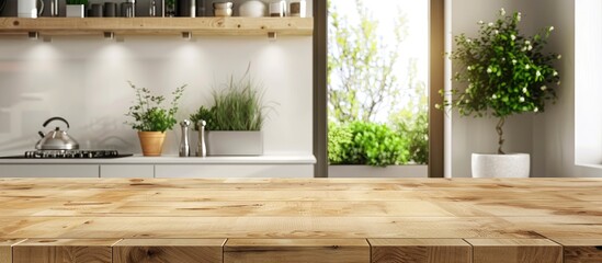 A wooden table with a wood stain finish is in the foreground, leading to a kitchen with hardwood flooring in the background, overlooking a grassy area through a window - obrazy, fototapety, plakaty