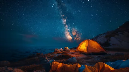  Beautiful night landscape with a wooden house on the top of the mountain. Camping on the beach. Night sky with stars and milky way. © Phichet1991