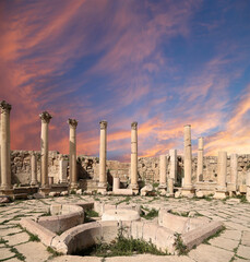 Roman ruins (against the background of a beautiful sky with clouds) in the Jordanian city of Jerash...