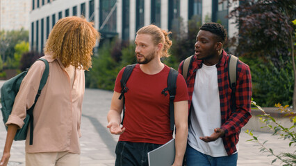 Group of mad emotional students multiracial friends Caucasian man guy with African American woman...