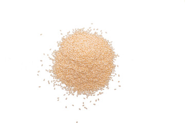 Sesame seeds heaped on an empty background